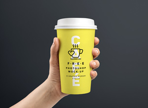 Coffee Cup In Hand MockUp